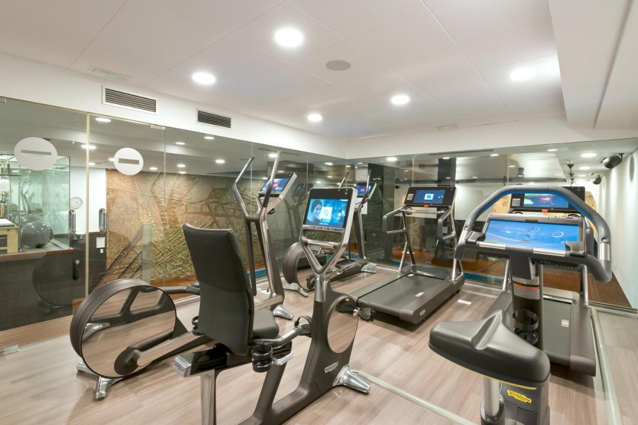 Hotel Miguel Angel Madri Exterior foto The gym at the hotel