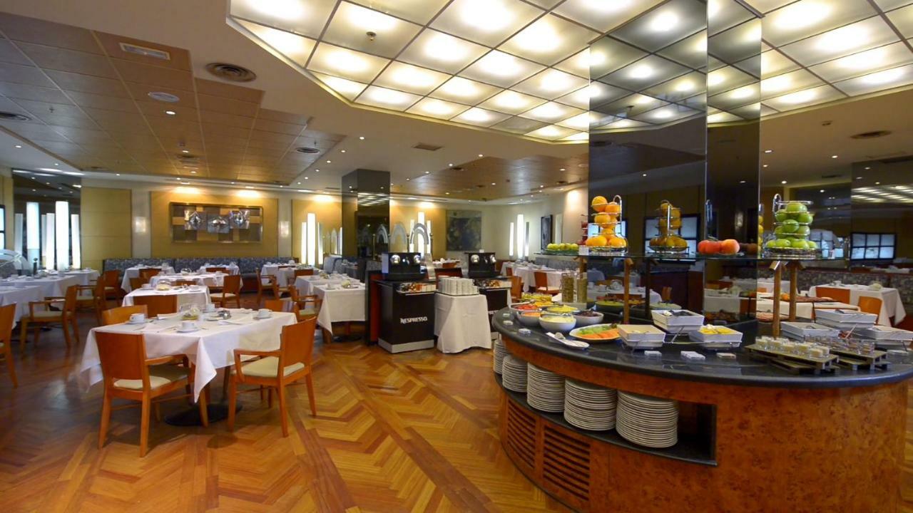Hotel Miguel Angel Madri Exterior foto The restaurant